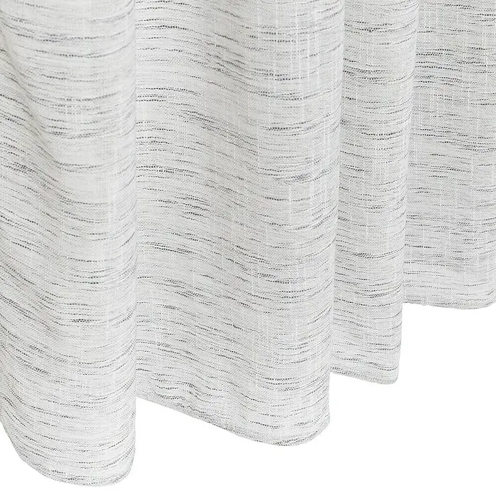 Visillo para ventana Argán - 140 x 250 cm, 100% poliéster, Gris - Primer plano de una cortina gris texturizada. El patrón de la tela ofrece una elegancia sutil y una textura suave para espacios habitables.