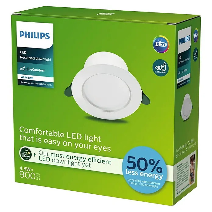 Philips Downlight LED empotrable Diamond Ultra Clase A - 4,8 W, Ø x Al: 12,5 x 4,95 cm, Blanco, Blanco cálido - Primer plano de un downlight empotrado LED de Philips en un paquete verde, destacando la eficiencia energética y el confort.