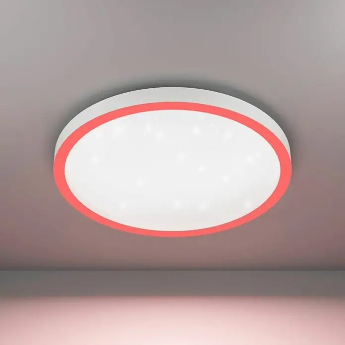 Eglo Smart-LED-Deckenleuchte rund Kristalleffekt - Ø x H: 57 x 7 cm, 34,5 W, RGBW, Weiß - Diese Nahaufnahme zeigt eine moderne LED-Deckenleuchte mit rotem Rand und Sternenmuster, die an einer grauen Decke montiert ist.