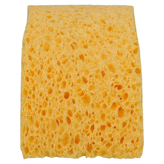 Nigrin Viskose-Schwamm - 19 x 7 x 6 cm - Nahaufnahme eines gelben Schwamms mit vielen Löchern, der sich ideal für die Reinigung eignet.\n