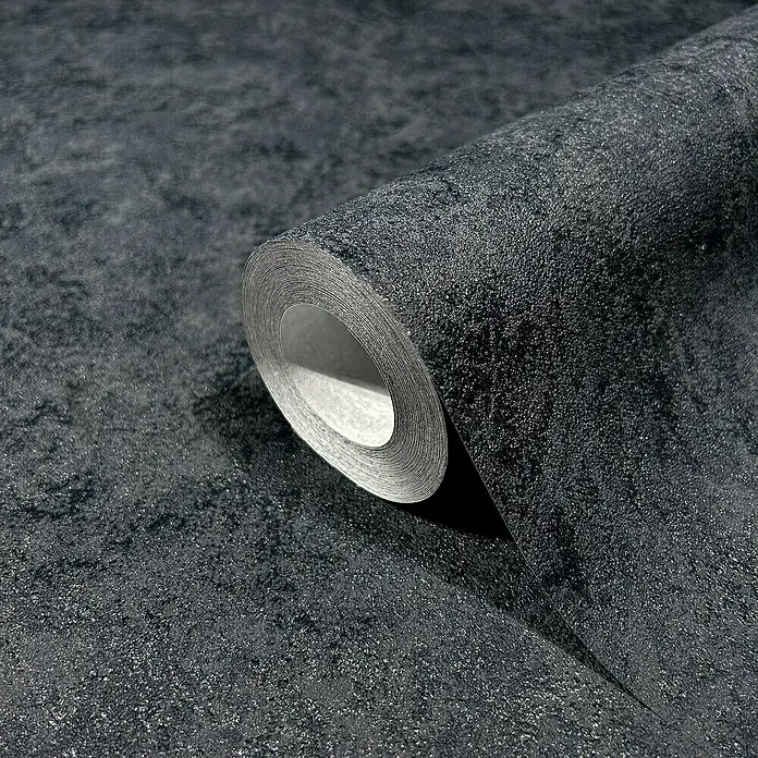 Marburg GZSZ Vliestapete - Shadow-Schwarz, Uni, 10,05 x 0,53 m - Nahaufnahme einer Rolle schwarzer Strukturtapete, die die feine Textur und die dunkle Farbgebung hervorhebt.