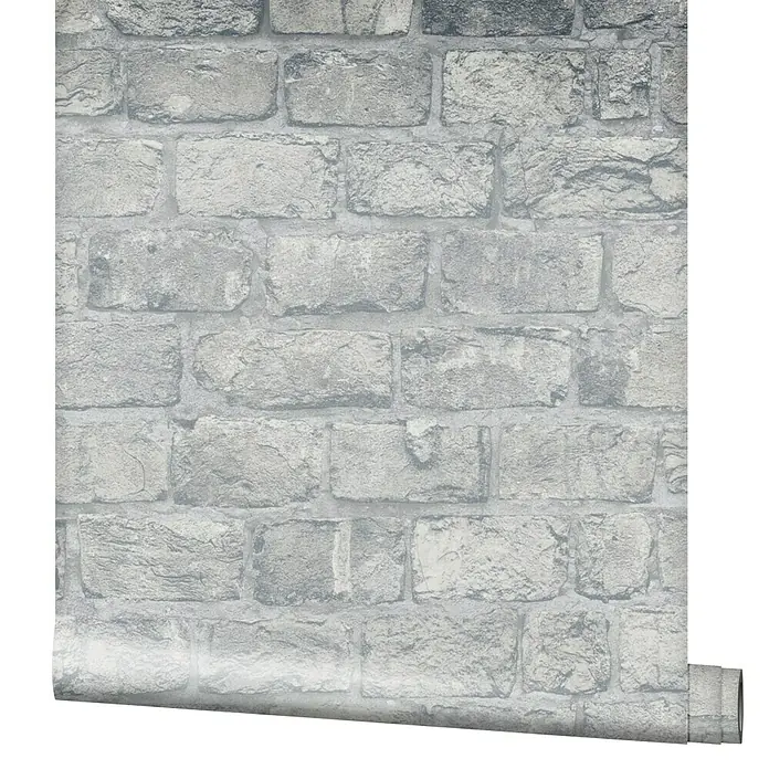 Marburg GZSZ Vliestapete Steinwand - Steingrau, Steinoptik, 10,05 x 0,53 m - Nahaufnahme einer grauen Backsteintapete, die eine realistische Mauerwerksoptik für eine moderne Inneneinrichtung bietet.