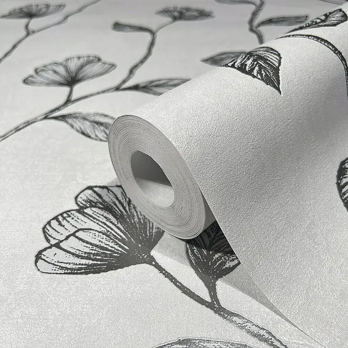 Marburg GZSZ Vliestapete Blumenranke - Grau/Silber, Floral, 10,05 x 0,53 m - Nahaufnahme einer Rolle weißer Tapete mit floralem Muster in Grau. Perfekt für stilvolle Wohnraumgestaltung und einfache Anbringung.