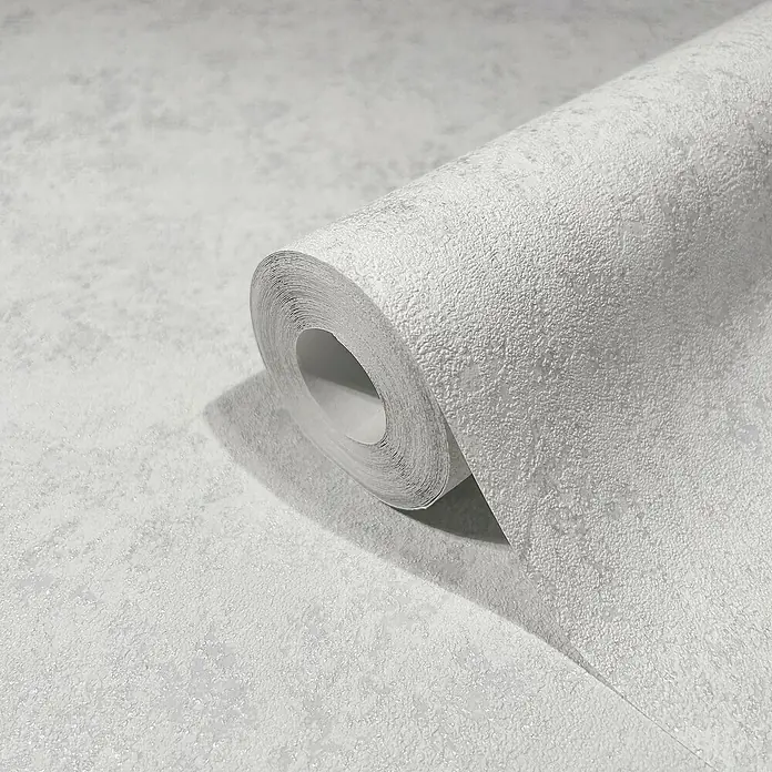 Marburg GZSZ Vliestapete - Shadow-Grau, Uni, 10,05 x 0,53 m - Nahaufnahme einer Rolle grauer, strukturierter Tapete, die eine subtile und elegante Wandgestaltung verspricht.