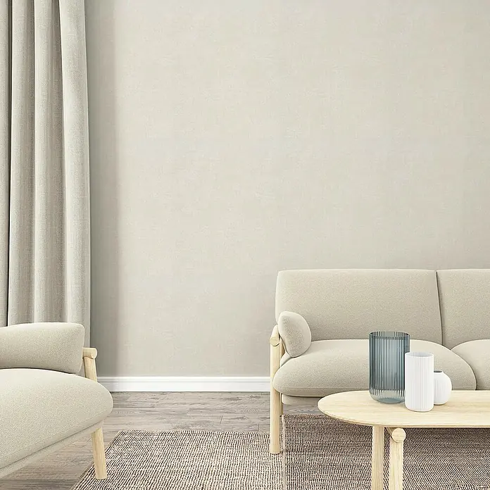 Marburg GZSZ Vliestapete - Hellbeige, Uni, 10,05 x 0,53 m - Helles Wohnzimmer mit beigen Möbeln und einer neutralen Farbpalette, die eine beruhigende und moderne Atmosphäre schafft.