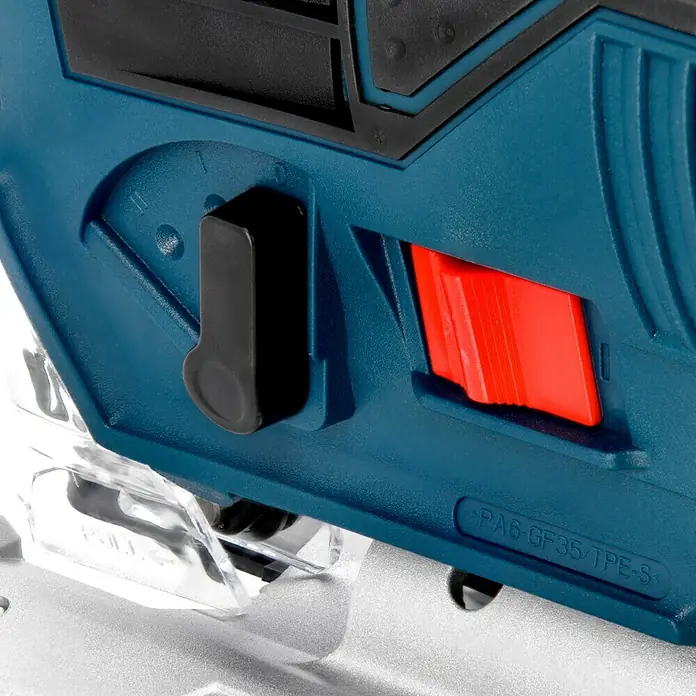 Bosch Professional Akku-Stichsäge GST 12V-7012 V, Li-Ionen, Ohne Akku, Leerlaufhubzahl: 1.500 /min - 2.800 /min - Detailaufnahme einer Stichsäge mit schwarzem Hebel und rotem Knopf, die ihre Funktionalität hervorheben.