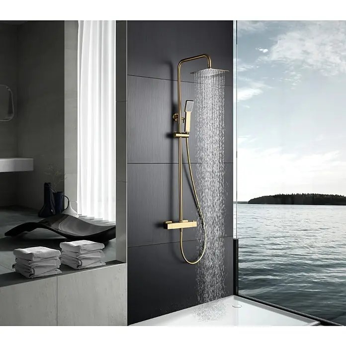 Imex Art Sistema de ducha - Grifo termostático, Oro - Elegante conjunto de ducha dorado con rociador de lluvia y ducha de mano. Diseño lujoso para una experiencia relajante en un baño moderno.