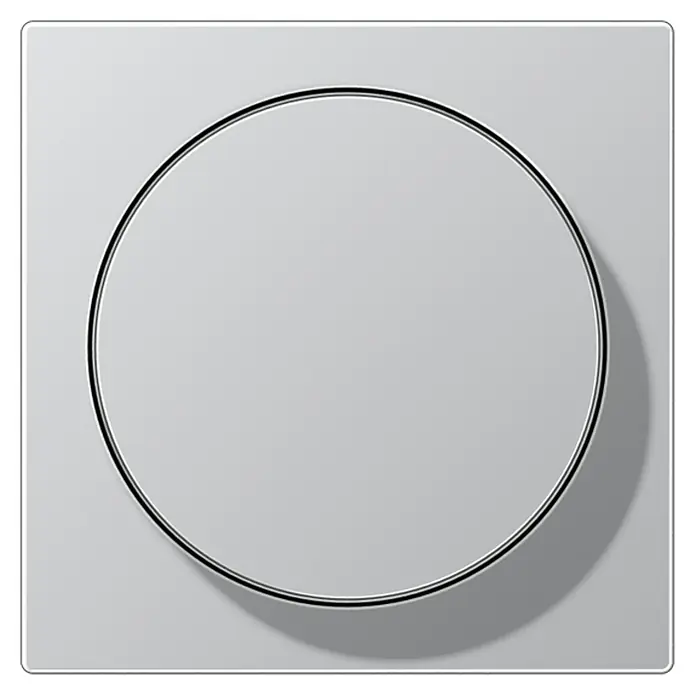 Jung A Dimmerabdeckung A1740AL - Aluminium, Kunststoff - Nahaufnahme eines eleganten, runden Lichtschalters mit Chromrand auf einer quadratischen, grauen Platte. Minimalistisch und modern.