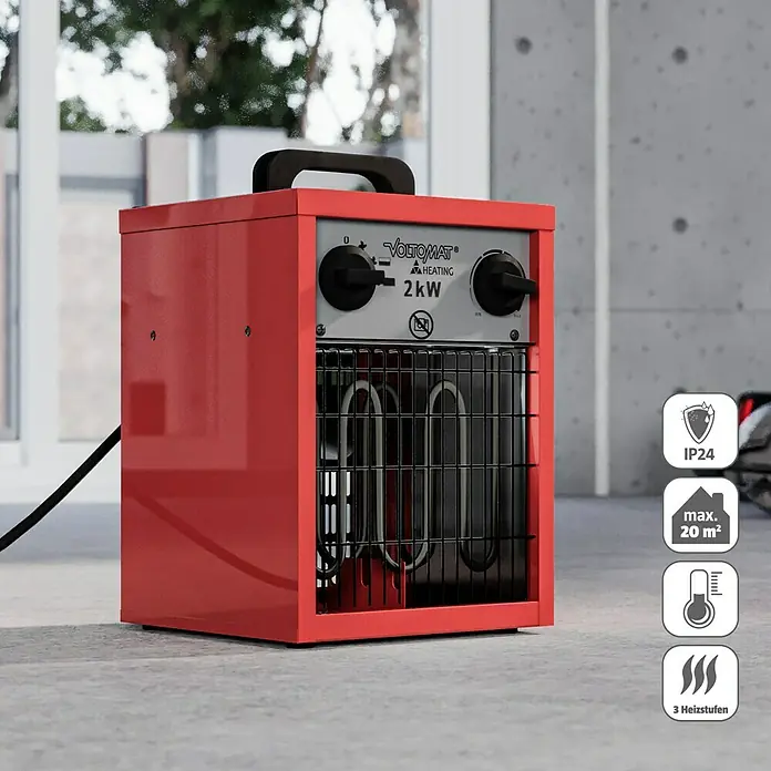 Voltomat HEATING Bauheizer - Passend für: Raumgröße bis ca. 20 m², 1.000 W - 2.000 W, Nennspannung: 220 V - 240 V, Rot, IP24 - Abbildung einer roten VOLTOMAT HEATING 2kW Heizung. Die Heizung hat einen Tragegriff und zwei Drehknöpfe zur Steuerung der Heizstufen.