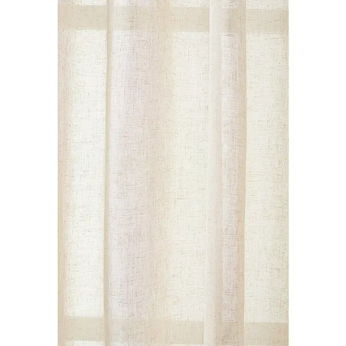 Cortina con ollaos Linum - An x Al: 140 x 300 cm, Lino - Primer plano de una cortina beige con una textura fina, filtrando suavemente la luz, creando un ambiente sereno y tranquilo.