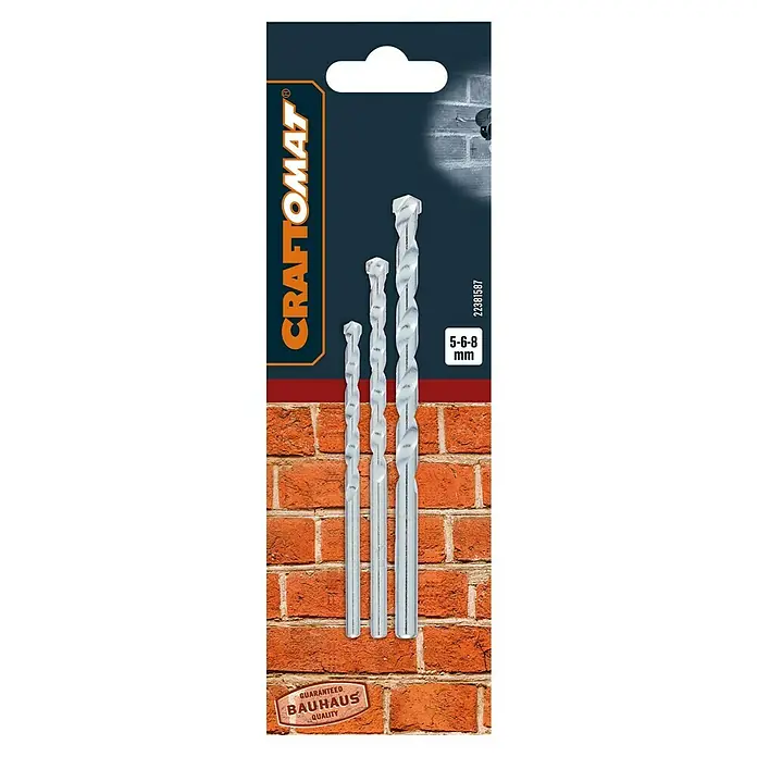 Craftomat Beton- & Steinbohrer - 3 -tlg., Durchmesser Bohrer: 8 mm - Aufnahme von drei CRAFTOMAT Steinbohrern der Größen 5, 6 und 8 mm vor einer Backsteinmauer, die sich ideal zum Bohren in Mauerwerk eignen.