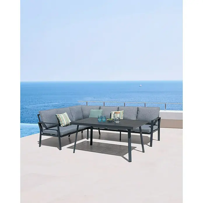 Conjunto de muebles Freya - 3 pzs., Aluminio, Antracita - Conjunto de salón de exterior gris con mesa de comedor en un patio con vistas al mar para momentos de relax al aire libre.