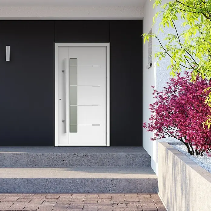 Gerda Haustür Thermo Prime 75 Brenta - 100 x 210 cm, DIN Anschlag: Links, Weiß, Details in Edelstahl - Moderne Haustür mit Glasfenster und langem Griff, eingebettet in eine dunkle Fassade, die einen stilvollen Eingangsbereich schafft.
