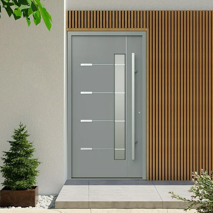 Gerda Haustür Thermo Prime 75 Brenta - 100 x 210 cm, DIN Anschlag: Rechts, Grau, Details in Edelstahl - Graue Haustür mit schmalem Glasfenster und vertikalen Holzpaneelen an einer Hausfassade.