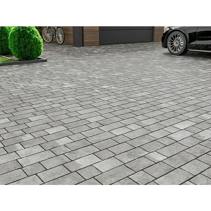EHL Pflasterstein Corte - Grau/Anthrazit, Gesamtstückzahl: 36 Stk., Rechteckig - Graue Pflastersteine bedecken eine Einfahrt, mit einem Auto und Pflanzen im Hintergrund, die die hochwertige Bauweise hervorheben.