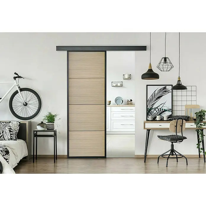 Kit atelier Holzschiebetür Loft Holz District - 930 x 2.128 mm, Schwarz Sandstruktur, Eichenholznachbildung - Moderne Schiebetür aus Holz mit schlichtem Design und dunklem Rahmen, die sich perfekt in ein modernes Interieur einfügt.