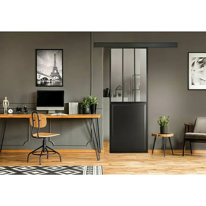 Kit atelier Glasschiebetür Loft Atelier - 930 x 2.040 mm, Einscheibensicherheitsglas (ESG) - Elegante Büroeinrichtung mit einer modernen Schiebetür. Die Glastür mit schwarzem Rahmen teilt den Raum stilvoll und lichtdurchlässig ab.