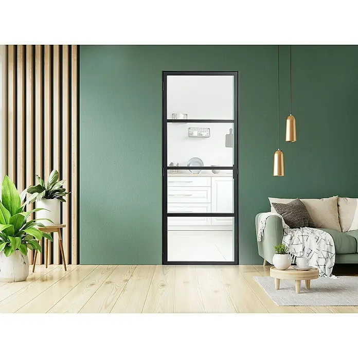 Kit atelier Drehtür Loft District880 x 2.005 mm, Links, Einscheibensicherheitsglas (ESG) - Ein modernes Interieur mit einer stilvollen Tür mit schwarzen Rahmen, die einen Blick in die Küche freigibt. Die Tür ergänzt das grüne Wanddesign perfekt.