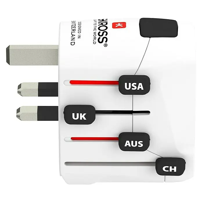 Skross Reiseadapter PRO Europe to World - Weiß - Nahaufnahme eines SKROSS-Reiseadapters mit verschiedenen Steckertypen für USA, UK, Australien und Schweiz.