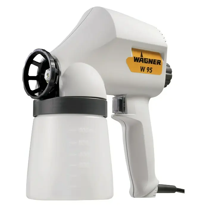 Wagner Sistema de pulverización de pintura W95 - 70 W, Caudal: 0,14 l/min - La imagen muestra un pulverizador de pintura Wagner W 95. El pulverizador es blanco con un recipiente negro y un logo amarillo de Wagner.
