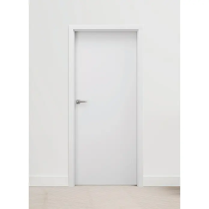 Invado Zimmertür ND1 ohne Schlüssellochbohrung - 735 x 1.985 mm, DIN Anschlag: Links, Verkehrsweiß matt, Röhrenspan - Schlichte weiße Innentür mit Türgriff in einer hellen Wand. Die Tür fügt sich nahtlos in das minimalistische Design des Raumes ein.