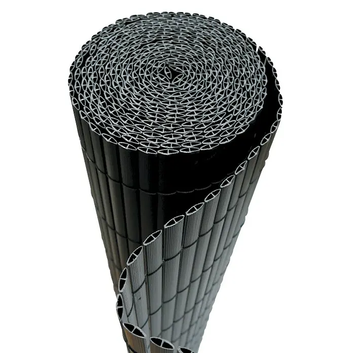 Ocultación Cañizo de PVC ovalado - Antracita, 3 x 1 m, PVC - Pantalla de privacidad de plástico negro enrollada. La pantalla de privacidad está medio enrollada y muestra su forma ovalada.