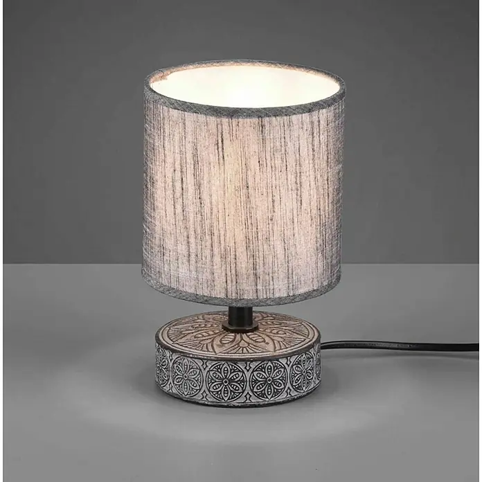 Trio Lighting Lámpara de sobremesa redonda Marie - 28 W, Ø x Al: 13 x 20,5 cm, Gris, E14 - Lámpara de mesa con pantalla gris y base decorativa con motivos florales, que emite una luz suave y cálida.