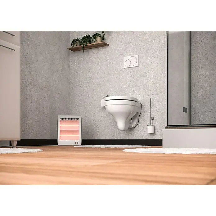 Voltomat HEATING Quarzheizstrahler - 30 x 14 x 33,5 cm, 800 W, Grau - Ein modernes Badezimmer mit einer wandmontierten Toilette, einem Heizgerät und Holzböden für ein stilvolles und komfortables Ambiente.