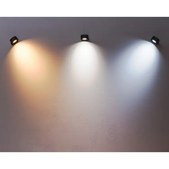 Lavida Akku-Wandleuchte Novara - L x B x H: 9,25 x 7,6 x 4,5 cm, 2 W, Schwarz, Mehrfarbig, Rund - Drei Wandleuchten mit unterschiedlichen Farbtemperaturen beleuchten eine Wand und demonstrieren die Vielfalt der Lichtwirkungen.