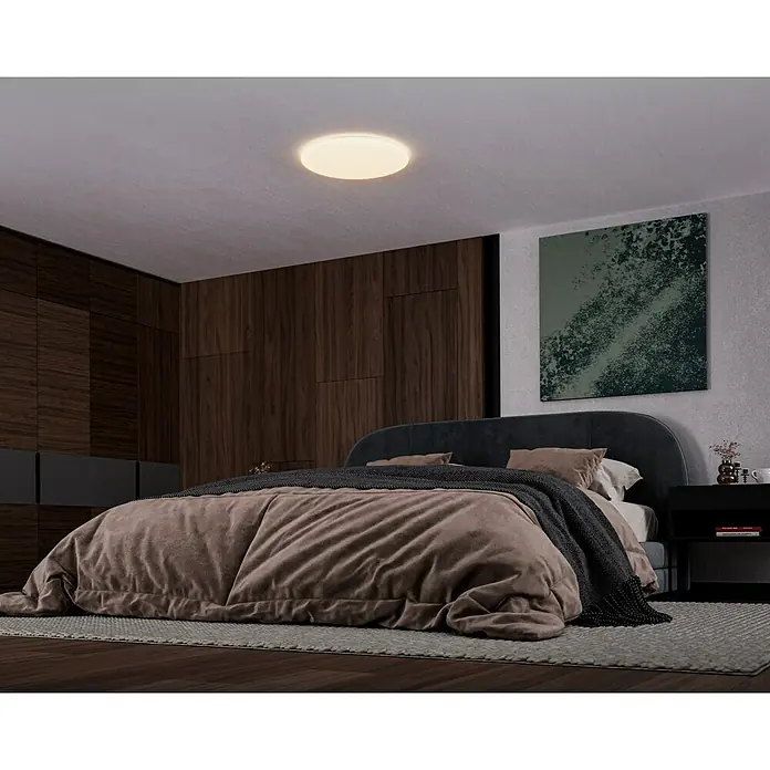 Eglo LED-Deckenleuchte rund POGLIOLA - 36 W, Ø x H: 50 x 8 cm, Weiß, Warmweiß - Das Bild zeigt eine moderne Deckenleuchte in einem Schlafzimmer. Die Leuchte ist rund und strahlt ein warmes, angenehmes Licht aus.