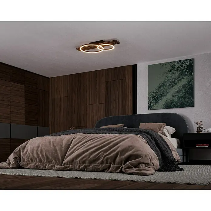 Eglo Boyal Plafón LED - 24 W, 78 x 40 x 9 cm, Madera/Claro, Blanco cálido, Número de bombillas: 2 ud. - Vista moderna de dormitorio con una lámpara de techo elegante con dos anillos de luz, que proporciona luz cálida. La lámpara está situada centralmente sobre la cama.