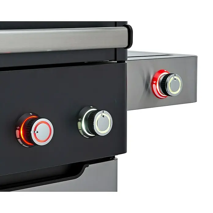 Edelheiss Gasgrill Exzellenz 1.6 - Grillfläche (B x T): 103 x 45,5 cm, 25,2 kW, Anzahl Brenner: 6 Stk. - Nahaufnahme eines Grills mit beleuchteten Knöpfen.