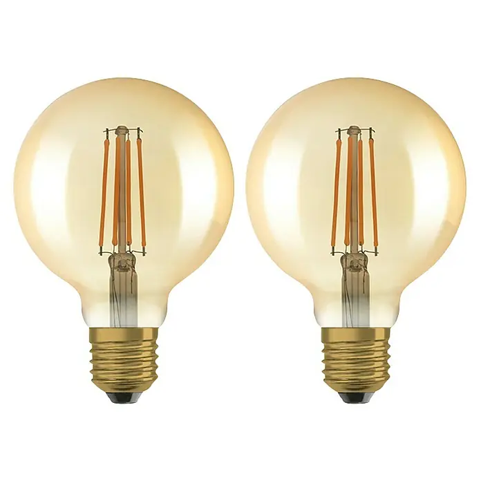 Osram LED-Lampen-Set Vintage Edition 1906 Globe-Form E27 2er Set - E27, Dimmbar, Warmweiß, 725 lm, 6,5 W - Zwei goldene Vintage-Glühbirnen mit Filamenten vor schwarzem Hintergrund.
