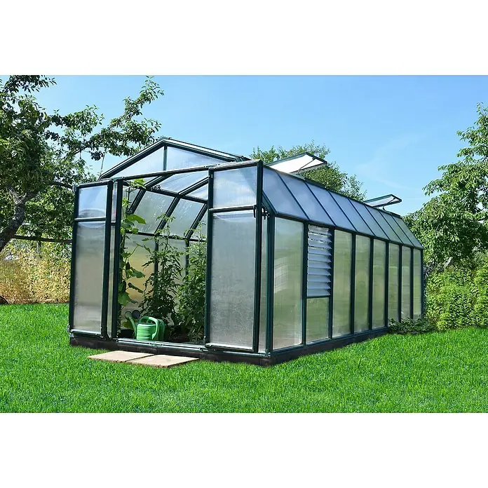 Palram – Canopia Invernadero Hobby Gardener - Medidas ext. (An x Pr): 266 x 516 cm, 6 mm, Verde - Un invernadero en el jardín con plantas dentro. El invernadero tiene una ventana y una puerta.