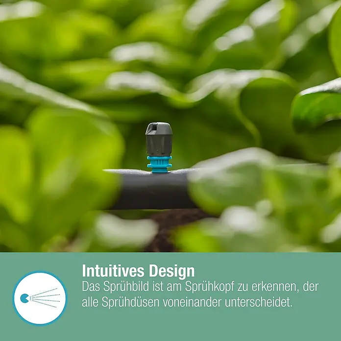 Gardena Micro-Drip Endstreifendüse - 5 Stk. - Nahaufnahme eines Bewässerungssprinklers zwischen grünen Pflanzen.