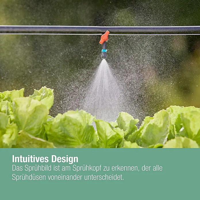 Gardena Micro-Drip Nebeldüse - 1/2" x 13 mm - Bewässerungssystem: Düse sprüht Wasser auf grüne Salatpflanzen, für eine optimale Bewässerung im Garten.