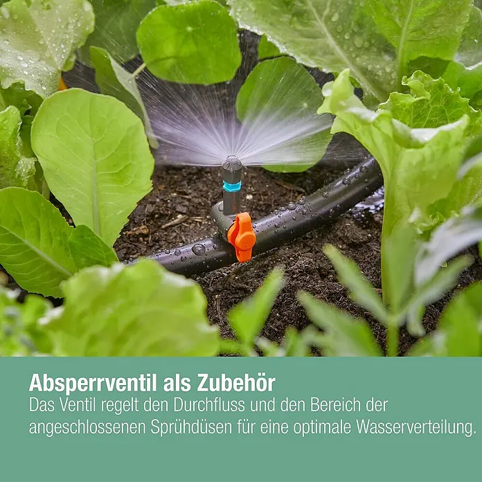 Gardena Micro-Drip Sprühdüse 180° - 5 Stk., 180 ° - Nahaufnahme eines Absperrventils mit Bewässerungssystem zwischen grünen Pflanzen.
