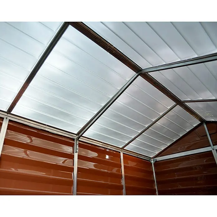 Palram – Canopia Caseta de jardín Skylight - Medidas ext. (An x Pr): 185 x 303,6 cm, Plástico, Ámbar - Vista al interior de un cobertizo con techo transparente y paredes marrones.
