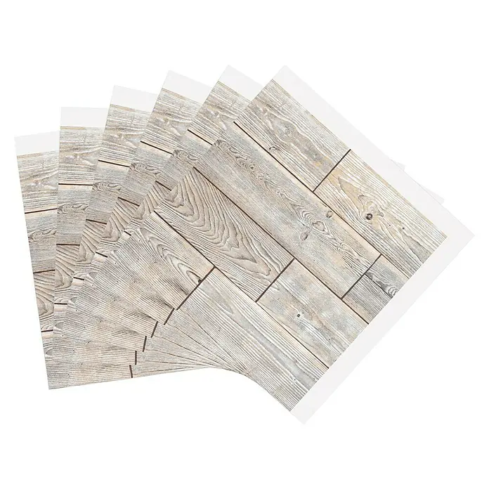 D-c-fix Fliesensticker - 6 Stk., 33,5 x 33,5 cm, Rustic Oak - Ein Stapel dekorativer Vinyl-Fliesen mit einem realistischen Holzplankenmuster und einem sauberen, weißen Rand für eine einfache Anwendung.