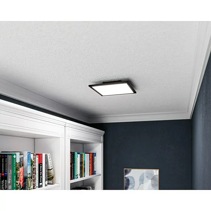 Tween Light LED-Panel CCT-RC-DIM - 15,5 W, L x B x H: 29,5 x 29,5 x 5 cm - Nahaufnahme einer quadratischen Deckenleuchte mit schwarzem Rahmen, die eine elegante und moderne Beleuchtungslösung für jeden Raum bietet.