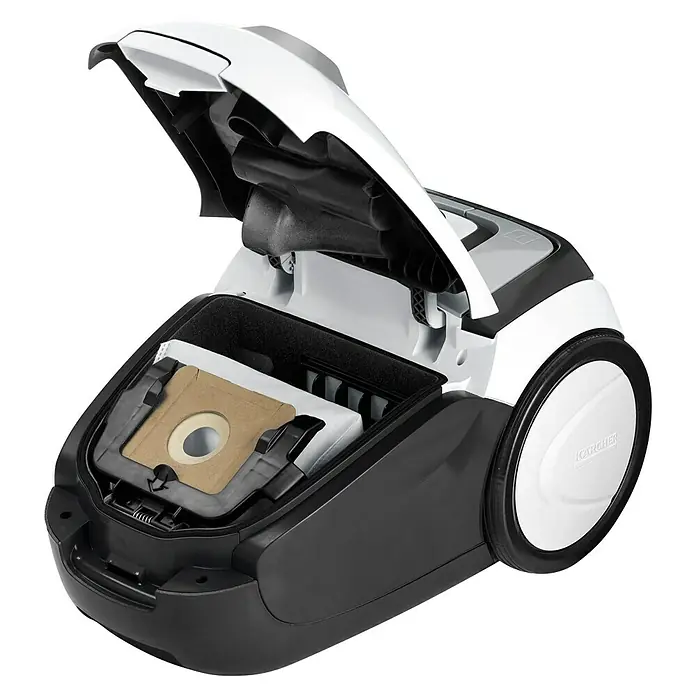 Kärcher Elektro-Staubsauger VC 2 - 700 W - Die Detailaufnahme zeigt einen Kärcher Staubsauger mit geöffnetem Fach, das den Staubbeutel des Geräts präsentiert.