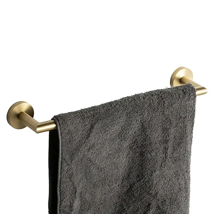 Tauro Baño Steel Toallero de barra - 45 cm, Oro - Un toallero dorado con una toalla gris colgada, perfecto para cualquier baño. Elegante y funcional.