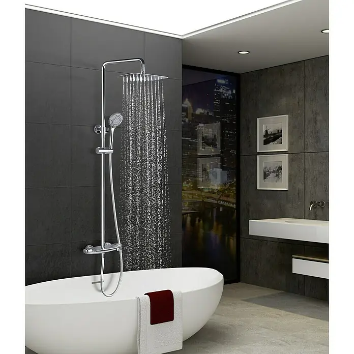 Imex Sistema de ducha Sidney - Con grifo termostático, Distancia entre orificios: 15 cm, Número de tipos de chorro: 1 ud., Cromo - Sistema de ducha con cabezal y ducha de mano sobre bañera exenta en un baño moderno. Diseño elegante para su baño.