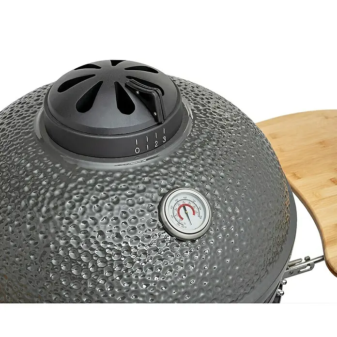 Flame Rock  Holzkohlegrill Kamado 22 Pro - Durchmesser Grillfläche: 49 cm, Grau - Nahaufnahme eines Kamado-Grills mit Temperaturregler und Thermometer, ideal zum Räuchern und Grillen.