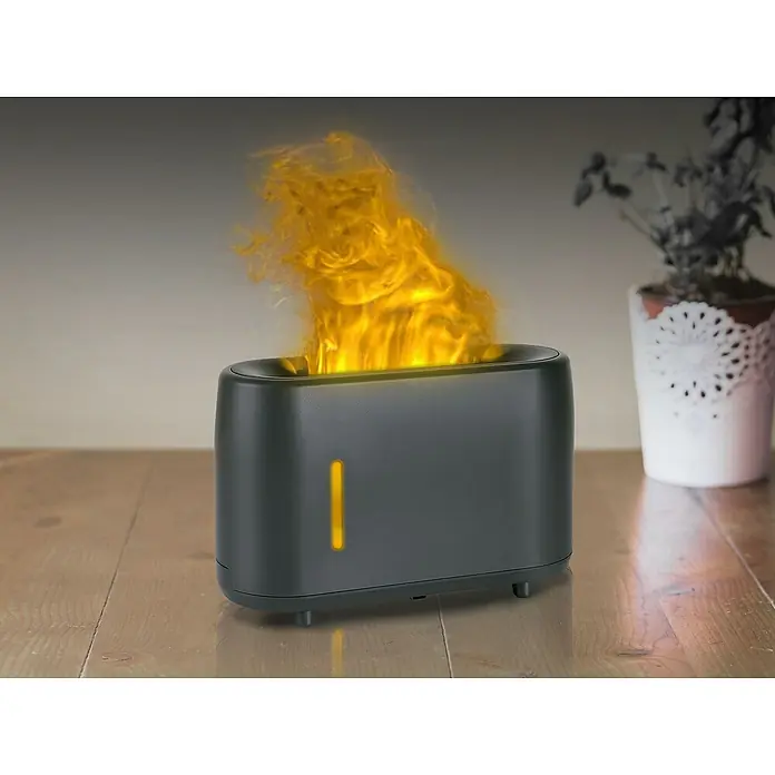 Purline Humidificador y difusor de aromas Sumu Fire - 8 x 20 x 11 cm, Negro - Un elegante difusor negro con efecto de llama que crea un ambiente relajante y, al mismo tiempo, humidifica el aire.
