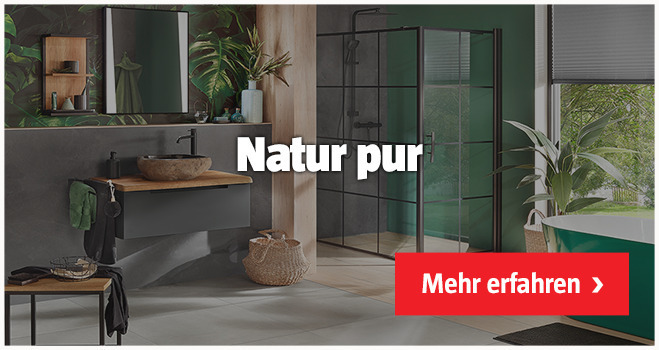 grün grau gestrichenes Badezimmer enhält Badmöbel mit Holzelementen