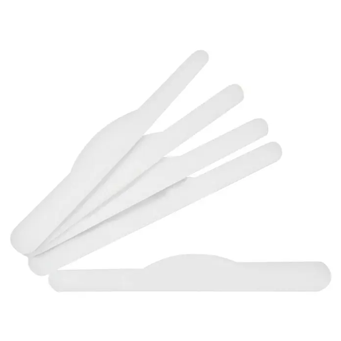 Connex Espátula para juntas de silicona - Plástico, 5 pzs., Longitud de la hoja: 15 cm - Primer plano de espátulas blancas utilizadas para aplicar cera o cremas. Ideal para estudios de cosmética o uso doméstico.