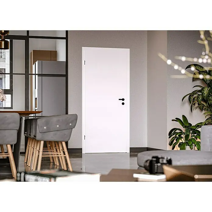 Invado Zimmertür ND1 - 860 x 2.110 mm, DIN Anschlag: Links, Verkehrsweiß matt, Röhrenspan - Eine moderne, weiße Innentür mit schwarzem Türgriff, die sich harmonisch in das stilvolle Interieur einfügt.