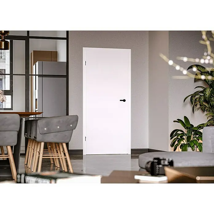 Invado Zimmertür ND1 ohne Schlüssellochbohrung860 x 1.985 mm, DIN Anschlag: Links, Verkehrsweiß matt, Röhrenspan - Eine moderne, weiße Innentür mit schlichtem, schwarzem Türgriff, die sich harmonisch in ein stilvolles Interieur einfügt.
