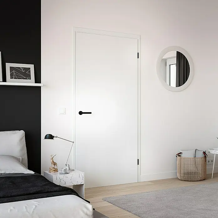 Diamond Doors Zimmertürgarnitur L-Form Premium Smart2Lock rechts - Stärke Tür: 38 mm - 45 mm, L-Form, Schwarz, DIN Anschlag: Rechts, Passend für: Türen ohne Schlüssellochbohrung, Türen mit Schlüssellochbohrung benötigen zusätzlich eine Blindrosette - Helle Inneneinrichtung mit einer eleganten, weißen Tür, die sich harmonisch in das minimalistische Design des Raumes einfügt.